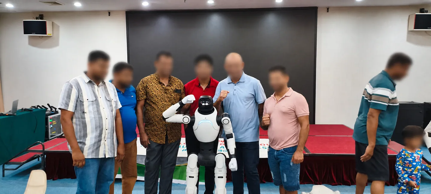 International visitors exploring service robotics